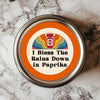 I Bless The Rains Down In Paprika Sticker – a humorous design featuring a paprika jar and vibrant rainbow backdrop, perfect for foodies and 80s music fans, ideal for adding fun to your kitchen decor with these Funny Kitchen Stickers.