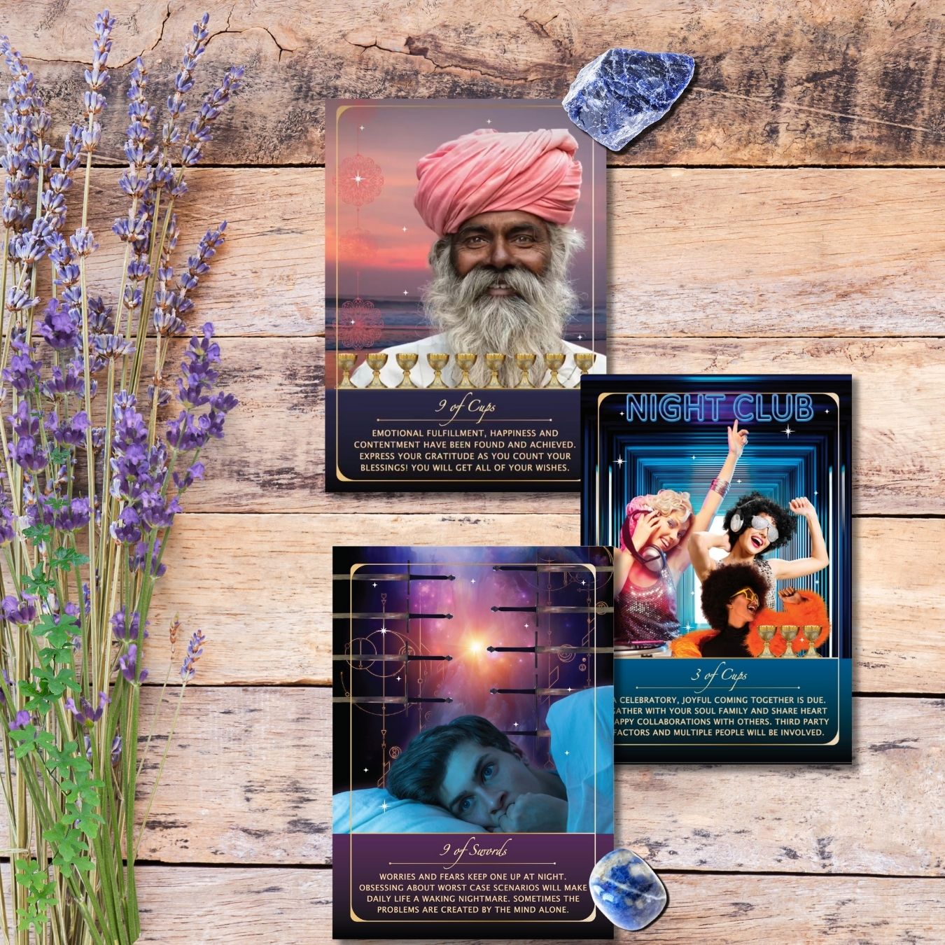 Three tarot cards on a wooden surface with lavender and crystals.