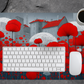 Stylish Fantasy Poppy Desk Mat shown in a modern workspace, designed with a smooth polyester top and steady natural rubber base for ultimate performance.
