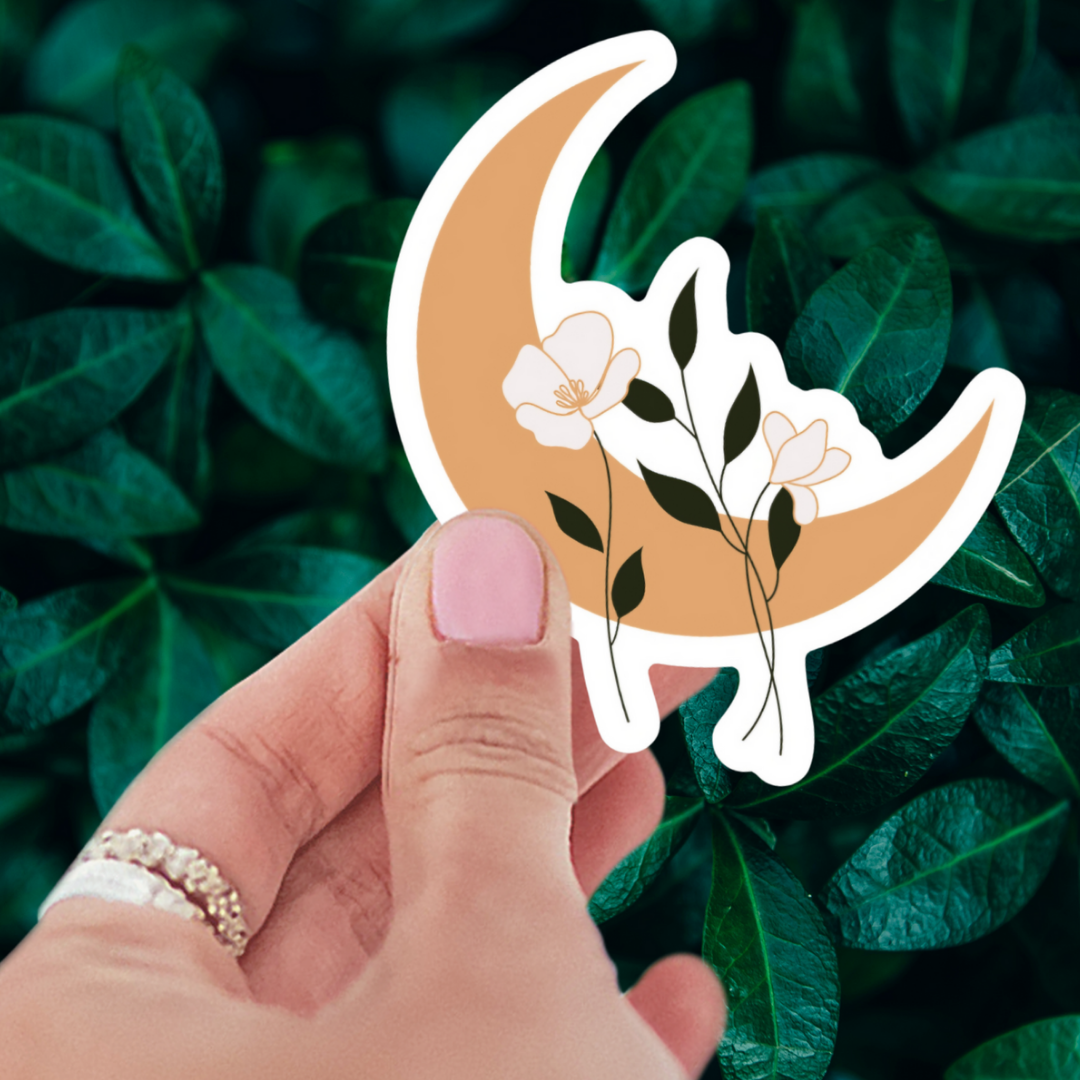 Enchanting Floral Moon Sticker design showcasing a crescent moon intertwined with colorful flowers, ideal for decorating laptops and water bottles.