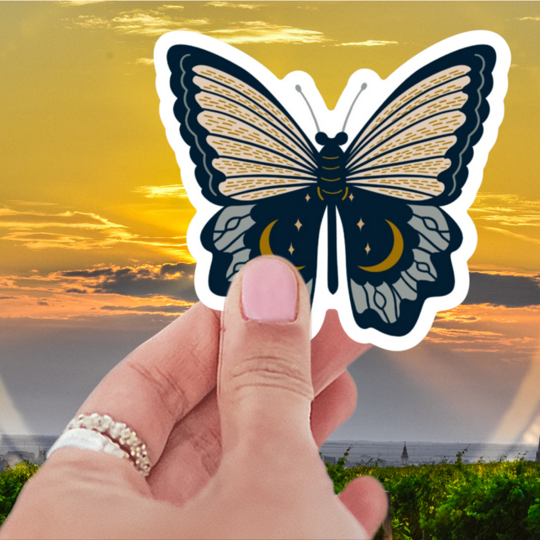 Black Moonlit Butterfly Sticker - Vibrant black butterfly sticker design featuring celestial motifs, crafted from waterproof matte vinyl, ideal for personalizing items.